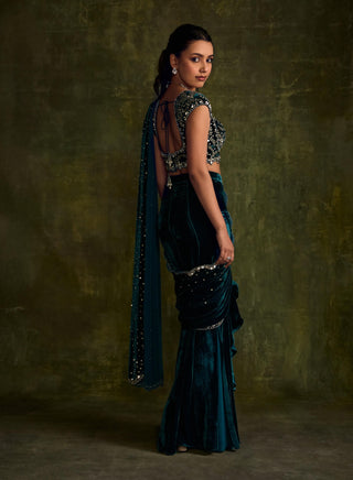 Turquoise Velvet Pre-Draped Sari And Blouse by Sanya Gulati available on Indiaspopup