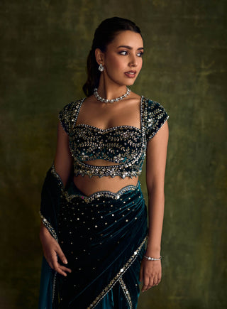 Turquoise Velvet Pre-Draped Sari And Blouse by Sanya Gulati available on Indiaspopup