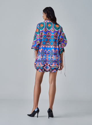 Sia Multicolor Ikat Shirt And Skort Set by Saaksha & Kinni, available on Indiaspopup.com