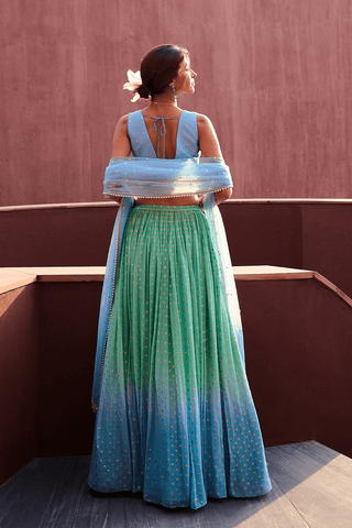 Emma Blue And Sea Green Lehenga Set by Chamee And Palak, available on Indiaspopup.com