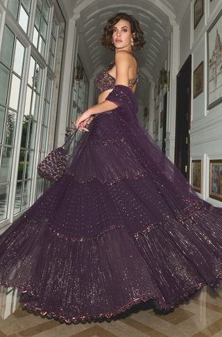 Purple Tiered Lehenga Set by Sanya Gulati available on Indiaspopup.com