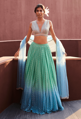 Emma Blue And Sea Green Lehenga Set by Chamee And Palak, available on Indiaspopup.com