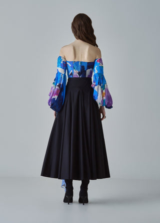 Taloola blue blouse and black skirt