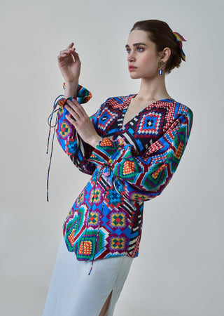 Nina Multicolor Ikat Blouse And White Skirt by Saaksha & Kinni, available on Indiaspopup.com