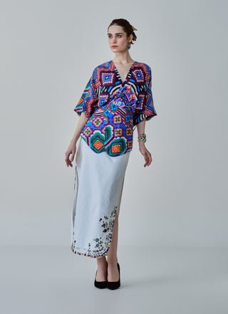 Nina Multicolor Ikat Blouse And White Skirt by Saaksha & Kinni, available on Indiaspopup.com