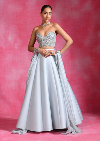 Icy blue corset lehenga set with cape