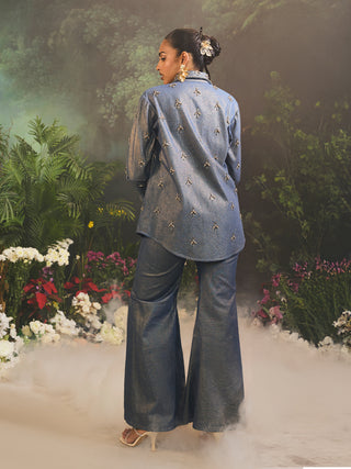 Astra blue denim shirt and flared pants