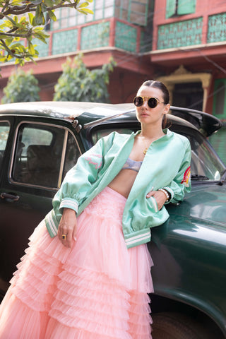 Pink tulle skirt and blue bralette with bomber