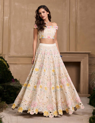 Ivory Pastel 3D Floral Applique Bustier And Lehenga by Chandrima available on Indiaspopup