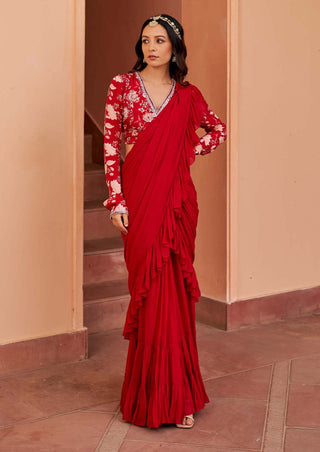 Red draped sari and blouse