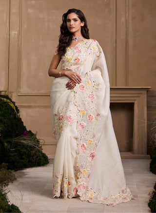 Ivory Pastel Floral Sari And Unstitched Plain Blouse by Chandrima available on Indiaspopup