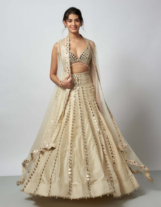 Shravani Ivory Lehenga And Cape Set by Gopi Vaid available on Indiaspopup