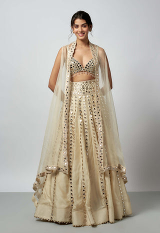 Shravani Ivory Lehenga And Cape Set by Gopi Vaid available on Indiaspopup