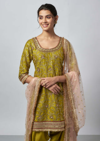 Surbhi green salwar and kurta set