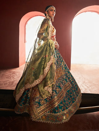 Teal Green Kani Silk Lehenga Set by Aditi Gupta available on Indiaspopup.com