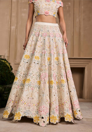 Ivory Pastel 3D Floral Applique Bustier And Lehenga by Chandrima available on Indiaspopup