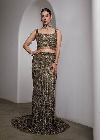 Emerald green fish-cut embellished lehenga and blouse