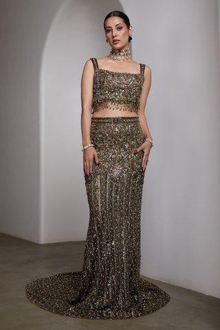 Emerald green fish-cut embellished lehenga and blouse