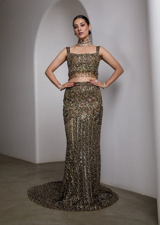 Emerald green fish-cut embellished lehenga and blouse