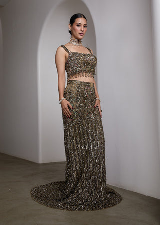 Emerald green fish-cut embellished lehenga and blouse