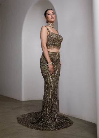 Emerald green fish-cut embellished lehenga and blouse