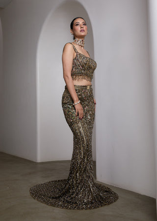 Emerald green fish-cut embellished lehenga and blouse