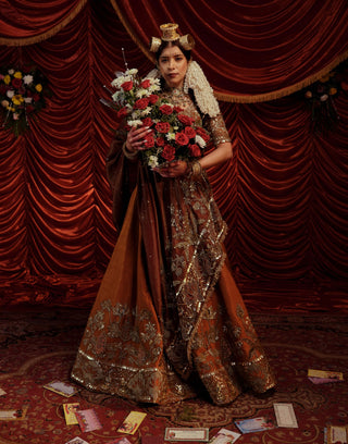 Rani Tawny Brown Lehenga Set by Payal And Zinal available on Indiaspopup.com