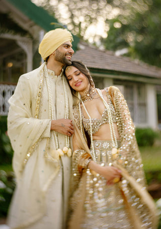 Mrigakshi blush pink lehenga and veil set
