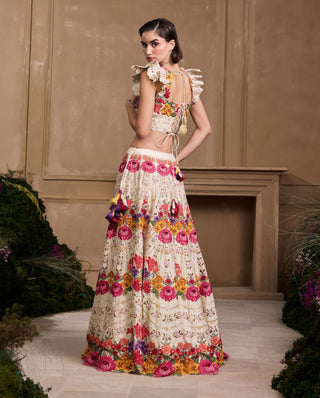 Ivory Multicoloured Floral Bustier And Lehenga by Chandrima available on Indiaspopup