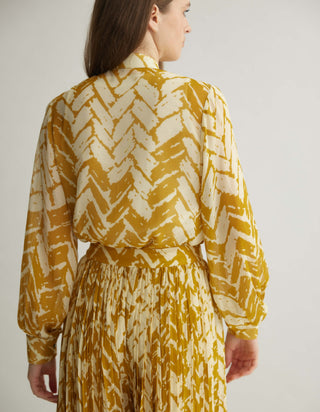 Beige and mustard chevron print shirt and pants