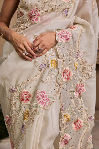 Ivory Pastel Floral Sari And Unstitched Plain Blouse by Chandrima available on Indiaspopup