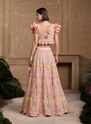 Soft pink contrast ruffled bustier and lehenga