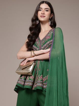 Green sleeveless solid kurti and sharara set