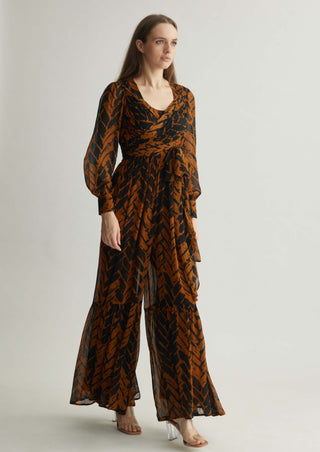 Rust and black chevron print wrap jumpsuit