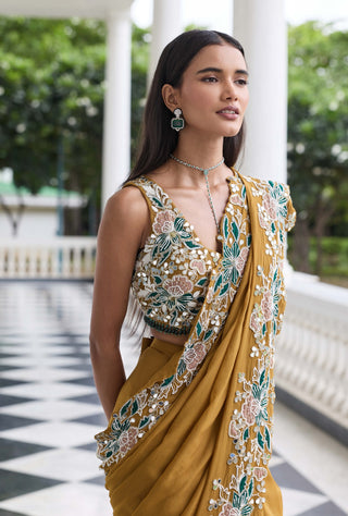 Niharika brass gold embellished sari with blouse