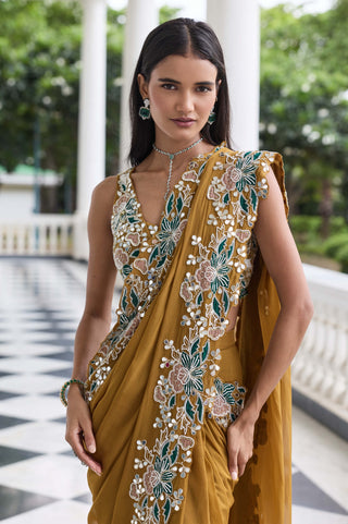 Niharika brass gold embellished sari with blouse