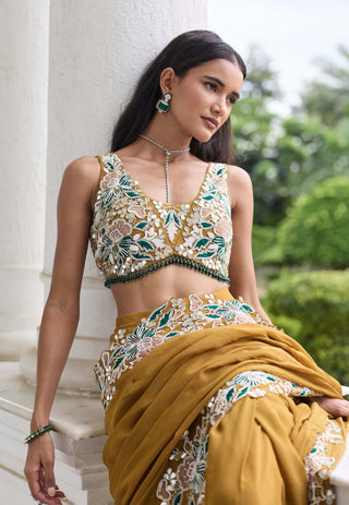 Niharika brass gold embellished sari with blouse