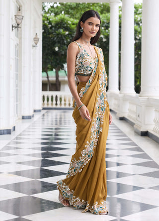 Niharika brass gold embellished sari with blouse