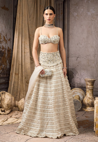 Ivory embellished tiered ruffle lehenga and blouse