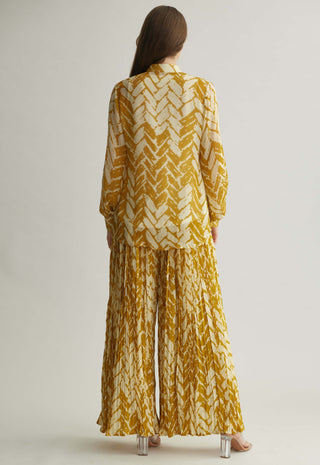 Beige and mustard chevron print shirt and pants