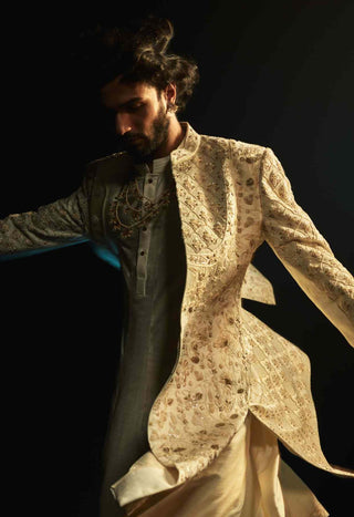 Ivory embriodered cutdana sherwani set