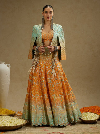 Sva By Sonam And Paras Modi Orange Blue Embellished Cape Jacket And Ombre Lehenga Set available on indiaspopup