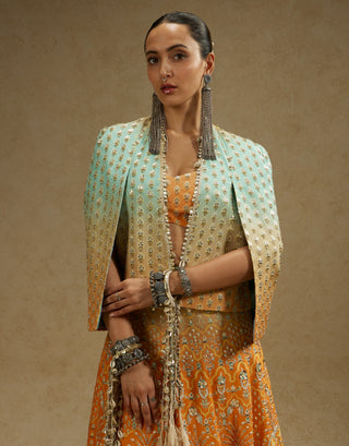 Sva By Sonam And Paras Modi Orange Blue Embellished Cape Jacket And Ombre Lehenga Set available on indiaspopup