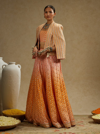 Sva By Sonam And Paras Modi Orange Pink Embellished Cape Jacket And Ombre Lehenga Set available on indiaspopup