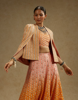 Sva By Sonam And Paras Modi Orange Pink Embellished Cape Jacket And Ombre Lehenga Set available on indiaspopup