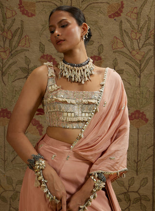 Pink embellished bustier and draped sari