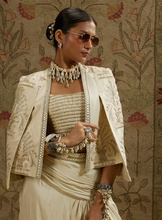 Sva By Sonam And Paras Modi Ivory Magnolia Cream Embellished Cape And Skirt Set available on indiaspopup