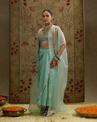 Sva By Sonam And Paras Modi Teal Blue Tassel Cape And Draped Skirt Set available on indiaspopup