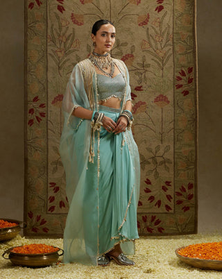 Sva By Sonam And Paras Modi Teal Blue Tassel Cape And Draped Skirt Set available on indiaspopup