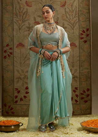 Sva By Sonam And Paras Modi Teal Blue Tassel Cape And Draped Skirt Set available on indiaspopup